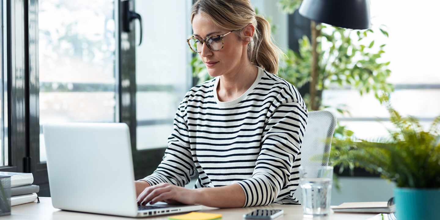 woman working from home on computer
